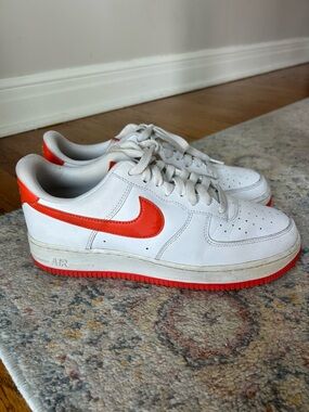Nike White Sneakers with Bright Orange Swoosh